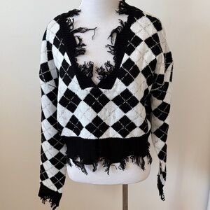 Elegant Black and White Argyle V-Neck Sweater